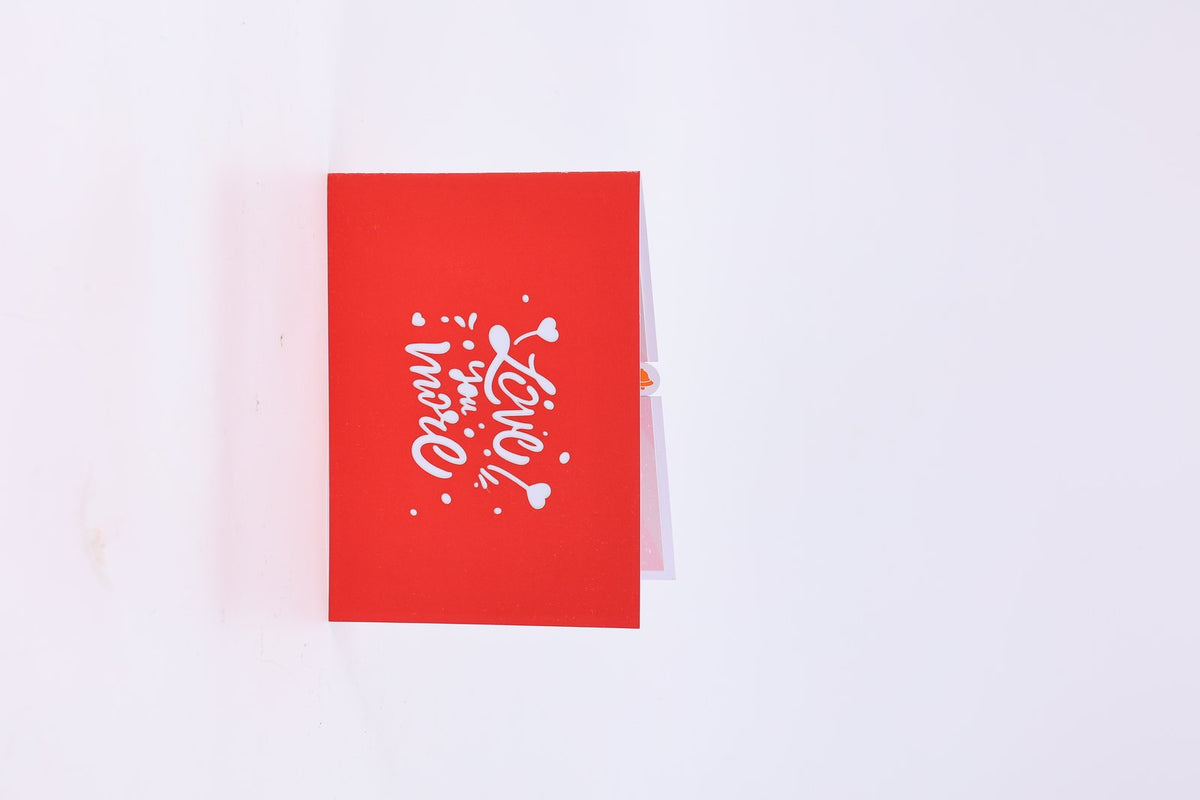 Love You More Heart-Shaped Greeting Card