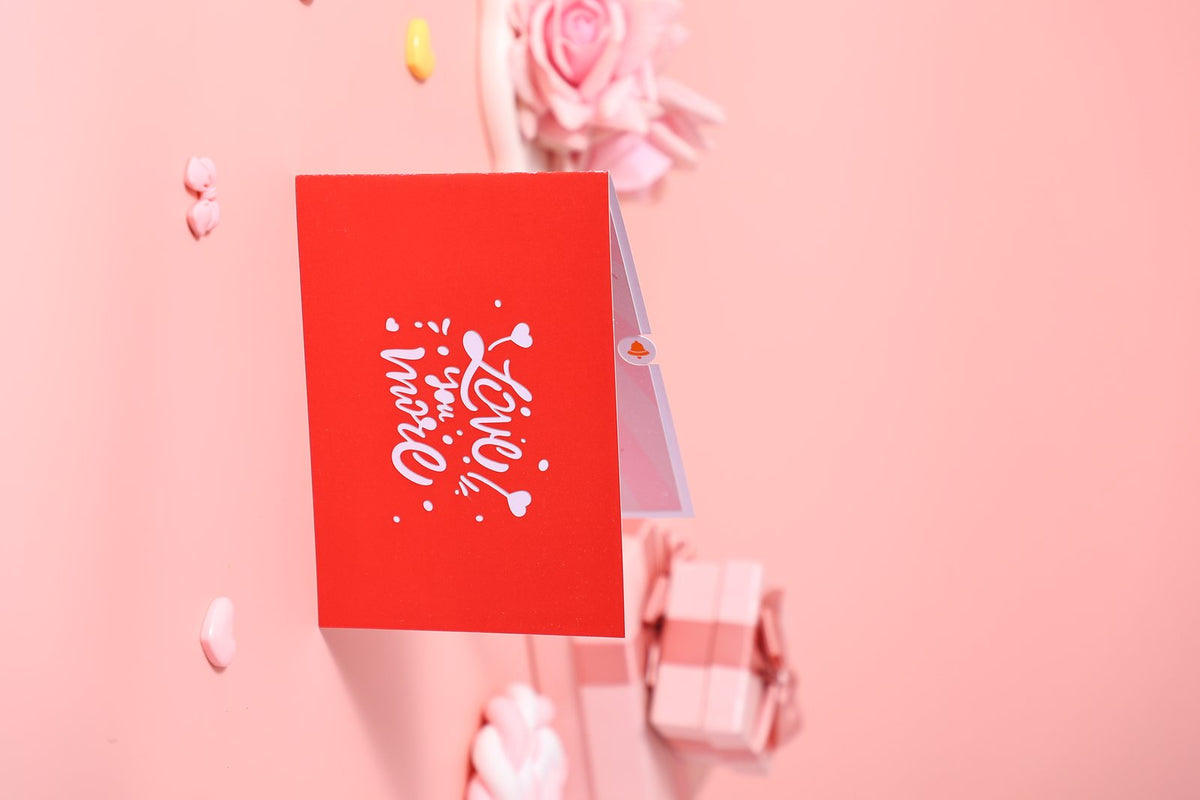 Love You More Heart-Shaped Greeting Card