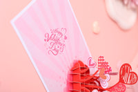 Love You More Heart-Shaped Greeting Card