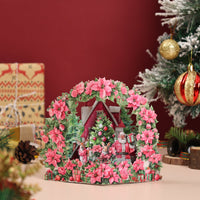Poinsettia Floral Wreath Snowy House Greeting Card