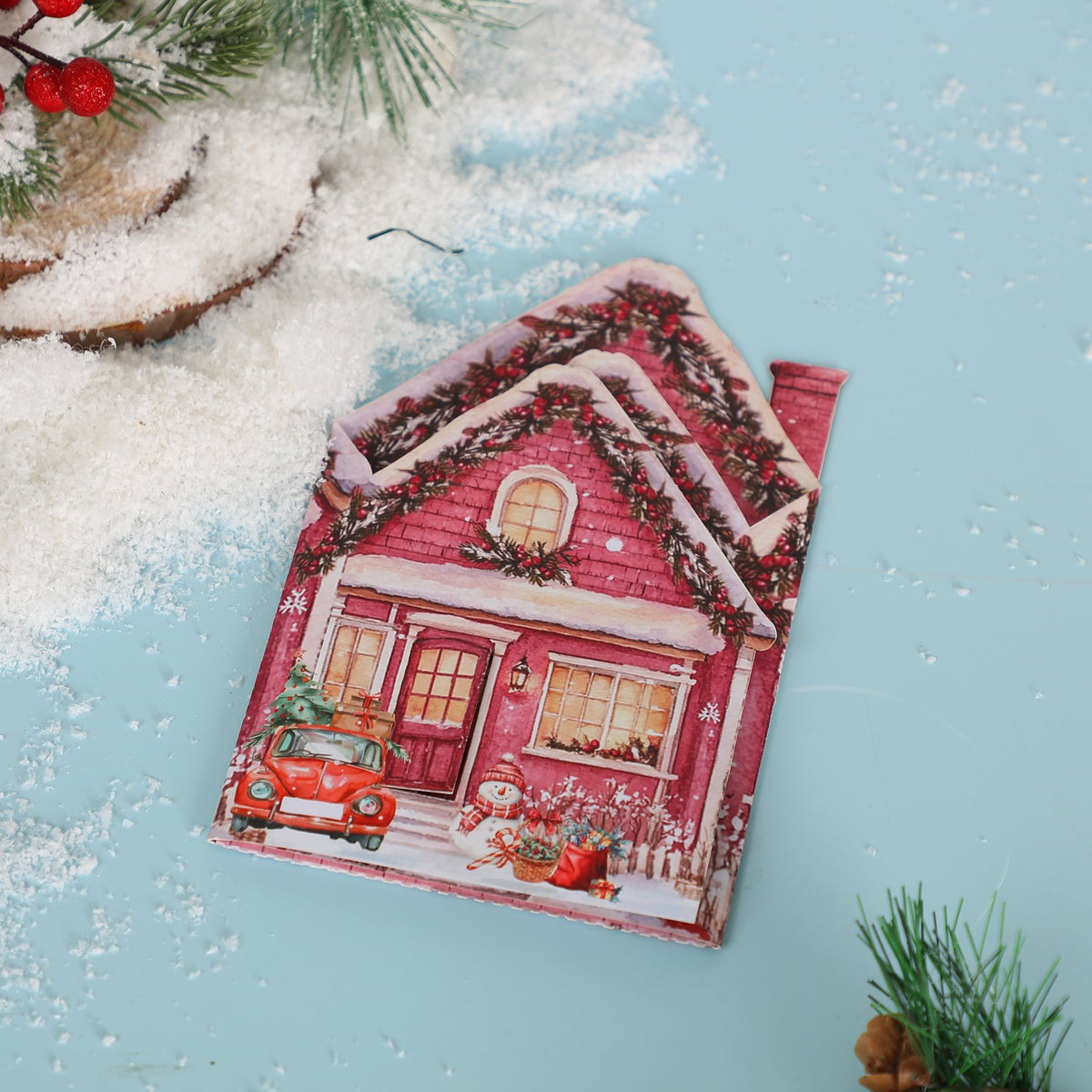 Pink Christmas Snowy House Greeting Card